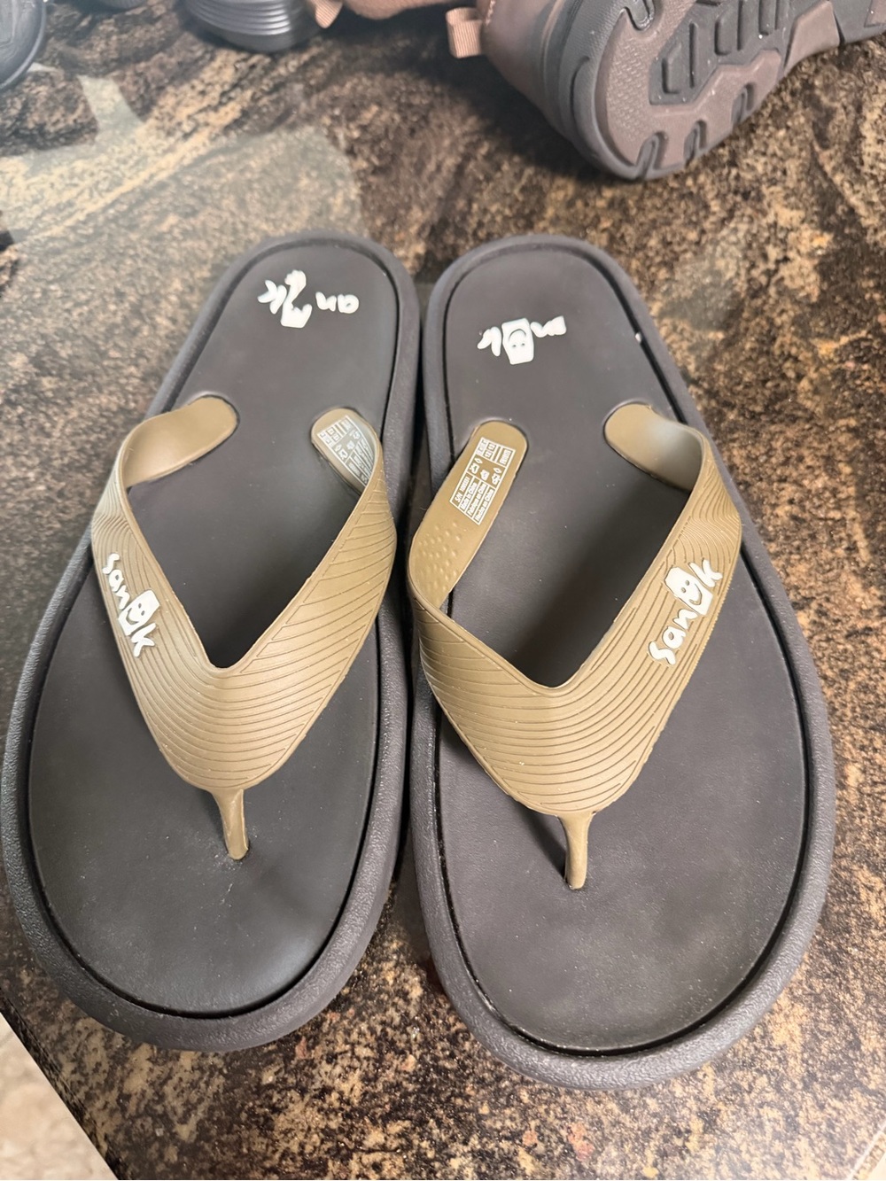 Sanuk Men's Tan Strap Black Footbed Flip-Flops